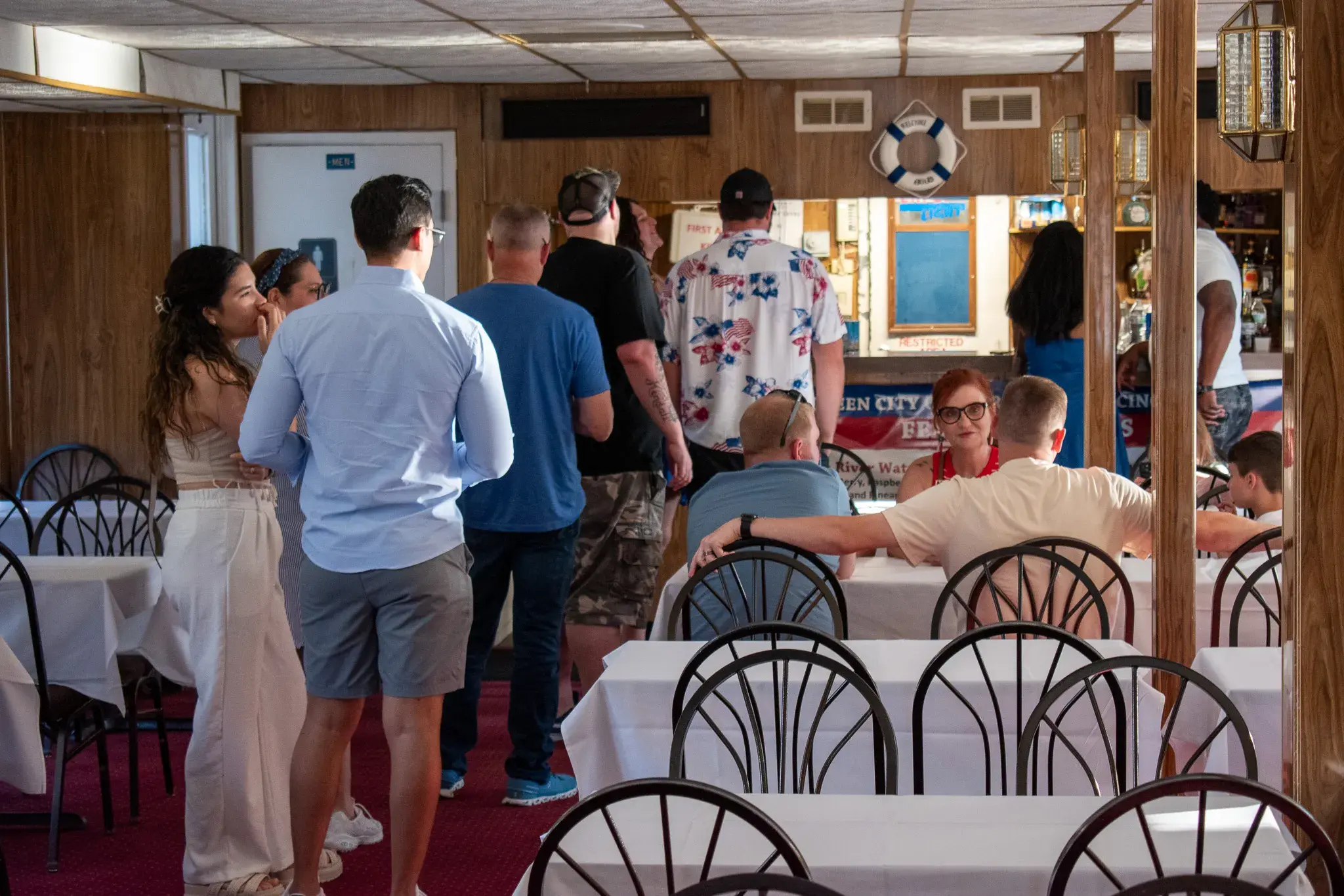 Guests gathering in the main deck dining room aboard the Spirit of Cincinnati